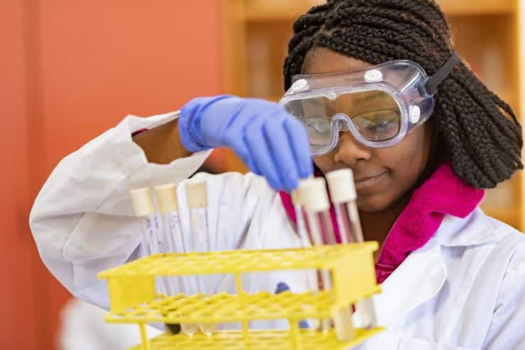 A chemistry student working in the lab