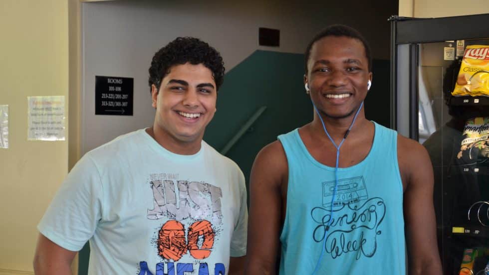 Two students in the Cumberland Hall lobby