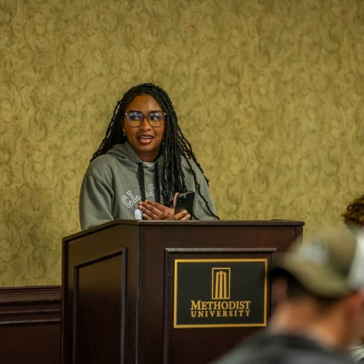 A student speaks at a Lunch and Learn event