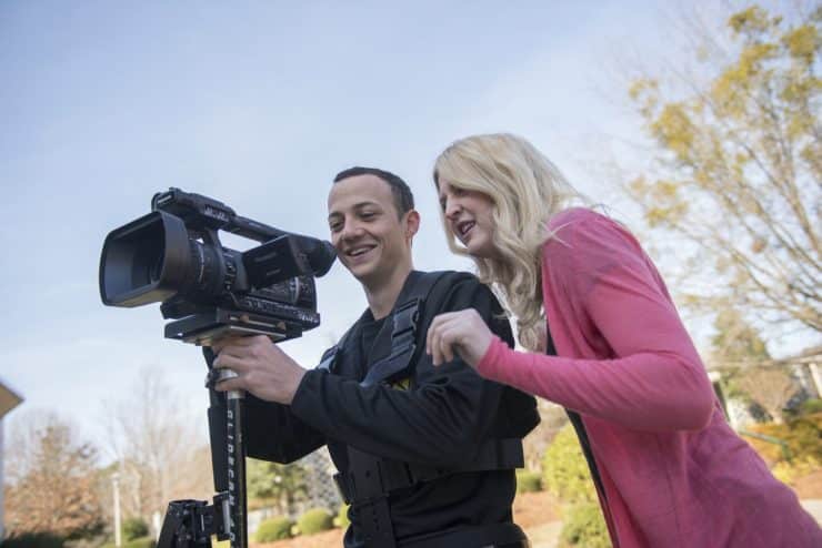 Students with a video camera