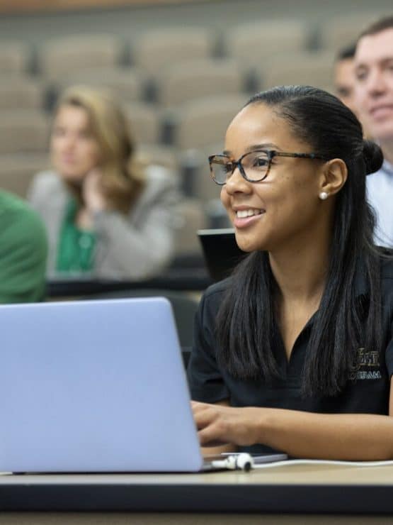 A student listens to a lecture at the Medical Lecture Hall