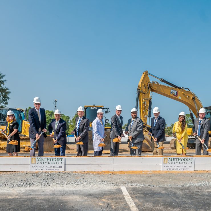 The speakers at Tuesday's groundbreaking included (L-R) Dr. Suzanne Blum Malley (Provost, Methodist University); Dr. Franklin Clark III (Chair, Methodist University Cape Fear Valley Health School of Medicine, Inc.); Dr. Rakesh Gupta (Board Chair, Methodist University); Michael Nagowski (CEO, Cape Fear Valley Health); Dr. Hershey Bell (Founding Dean, Methodist University Cape Fear Valley Health School of Medicine); Dr. Stanley T. Wearden (President, Methodist University); Glenn Adams (Chair, Cumberland County Commissioner and Board Member, Cape Fear Valley Health); Jimmy Keefe (Cumberland County Commissioner and Vice Board Chair, Cape Fear Valley Health); Dr. Toni Stewart (Vice Chair, Cumberland County Commissioner and Board Member, Cape Fear Valley Health); Brian Raynor (Golden LEAF Foundation); Scott Hamilton (Golden LEAF Foundation)