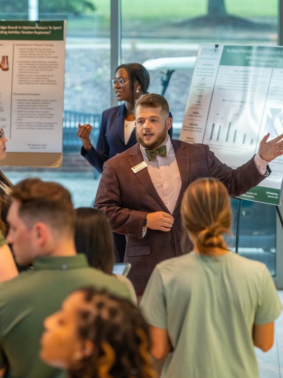 A student makes a presentation at the 2024 Doctor of Physical Therapy Program Poster Presentations