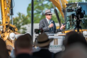 Dr. Stanley T. Wearden, president of Methodist University, speaks to the nearly 300 guests who attended the school's groundbreaking ceremony in September. 