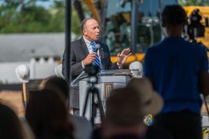 Mike Nagowski, CEO of Cape Fear Valley Health, speaks to the nearly 300 guests who attended the school's groundbreaking ceremony in September. 