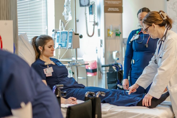 A medical faculty member instructs students