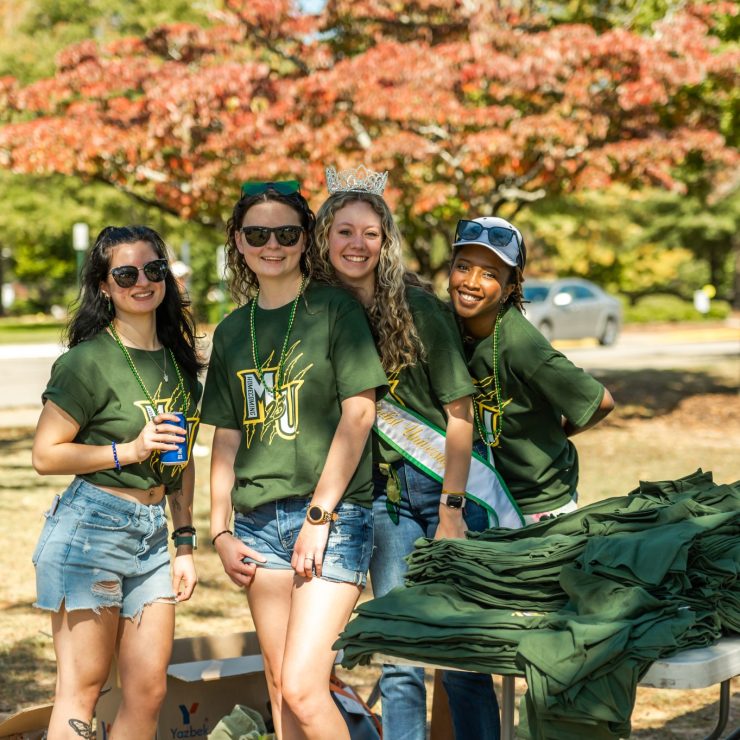 Students at a Homecoming tailgate